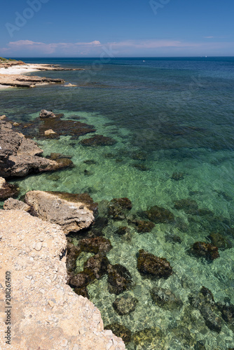 Les Rotes rocky beach near Sant Antonio cape, Denia, Alicante province, Costa Blanca, Spain