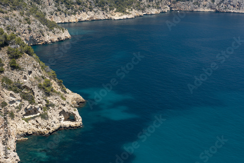 The rocky cliffs in the Cala La Granadella, Javea, Costa Blanca, Alicante province, Spain