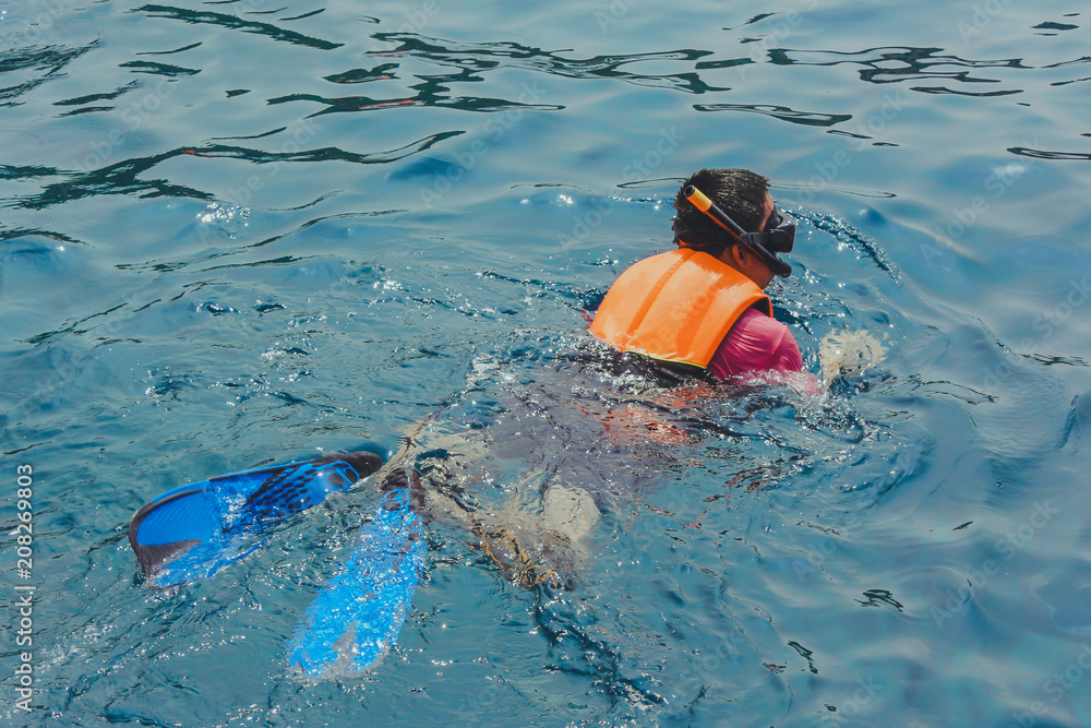 Happiness Tourists  snorkel at Similan Island Phang-Nga,Thailand