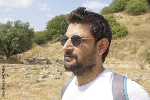 Handsome Man Portrait in Kyme Ancient City,Turkey photo