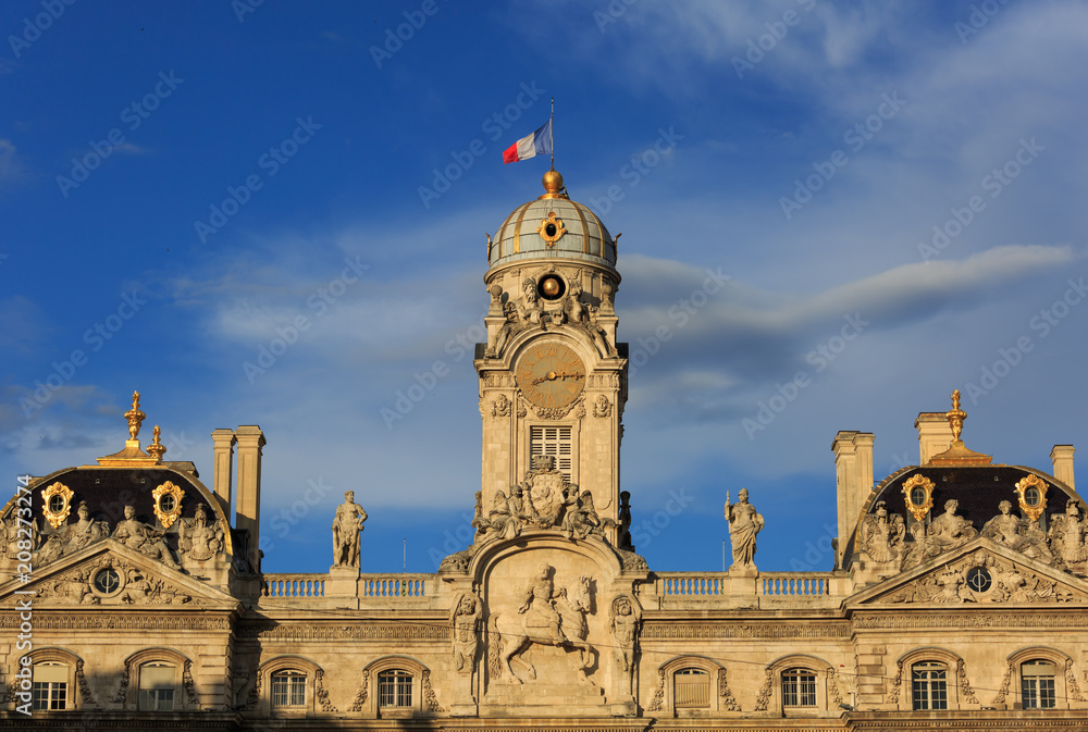City hall (Hotel de Ville) of the city of Lyon in the warm, evening sunlight. France.