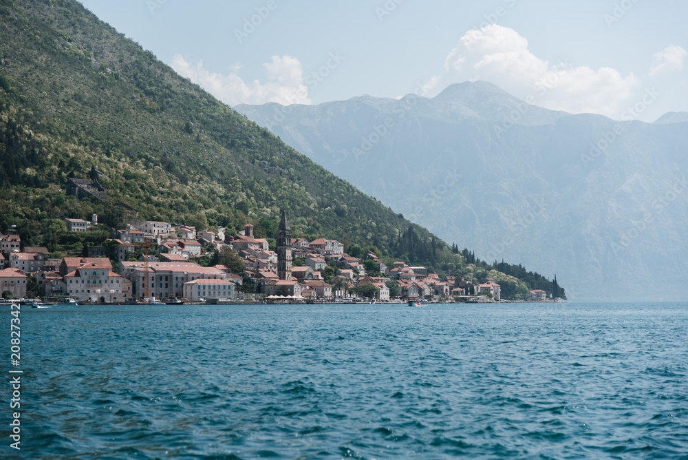 City Along the Coast in Montenegro, Mountains and Blue Ocean Water