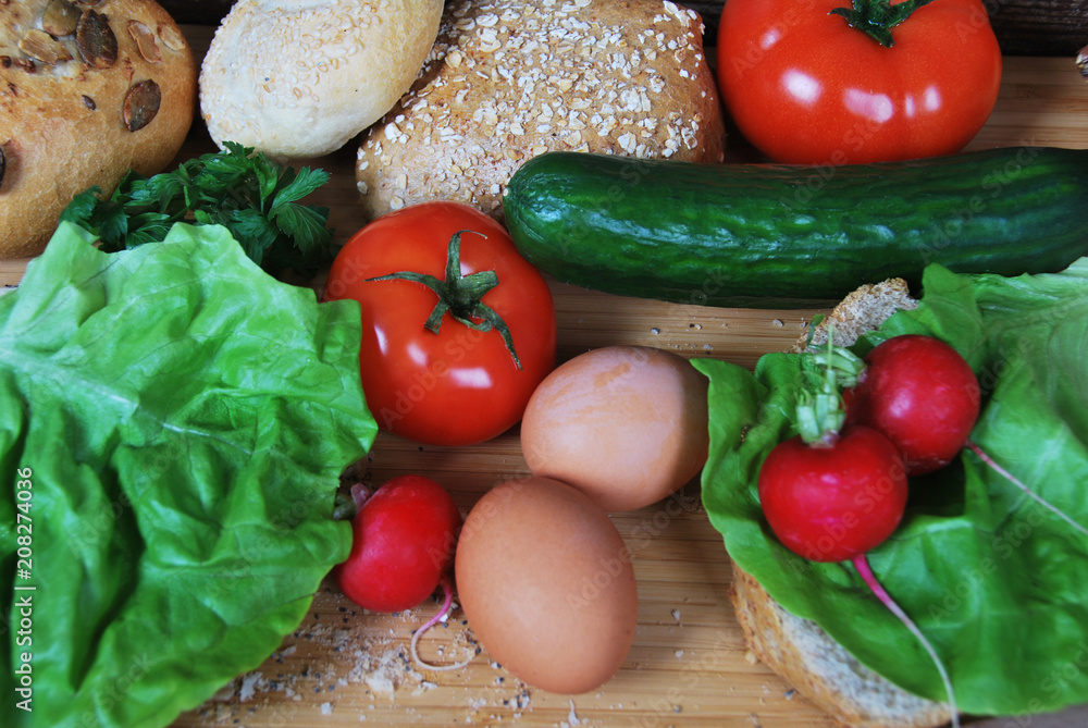 roll with oatmeal two boiled eggs two radishes and fresh buns with seeds in the company of cucumber and tomato roll with oatmeal two boiled eggs two radishes and fresh buns with seeds in the company of cucumber and tomato