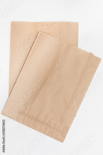 brown paper bag for bread on white background