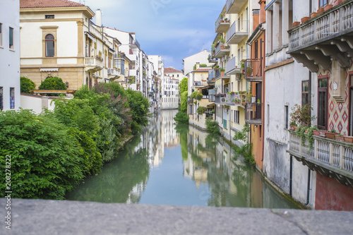 Padova, Italy - May, 6, 2018: Houses on a bank of channel in Padova