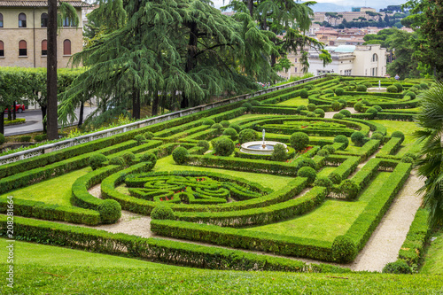View at Vatican Gardens with beautiful green lawns and trees, landscaping, Rome, Italy. photo