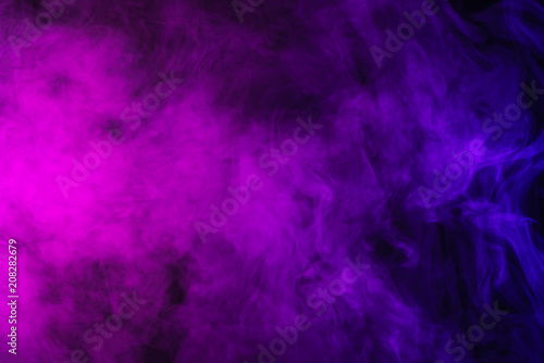 abstract pink and purple smoke on black background