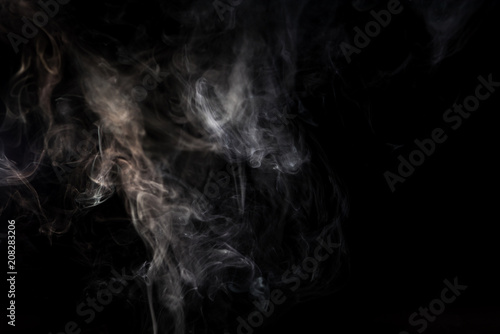 abstract texture with grey smoky swirl on black