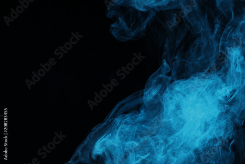 blue mystical smoke on black background