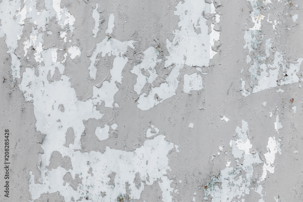 Fototapeta premium Wall fragment with scratches and cracks
