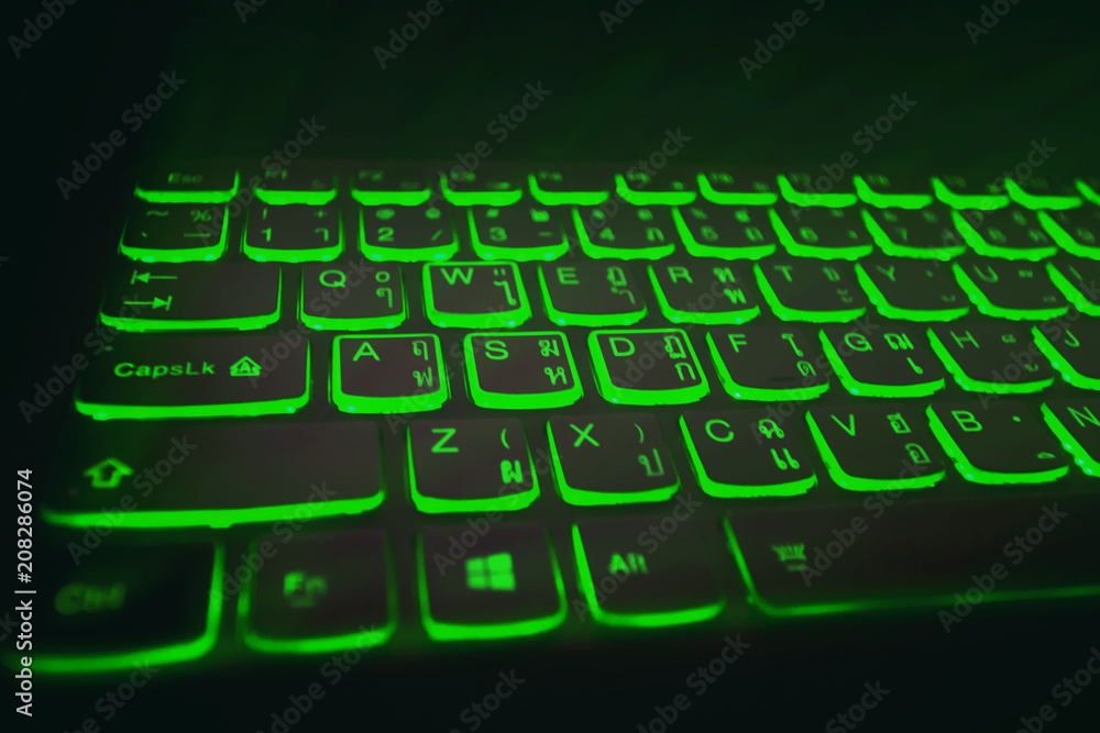 Keyboard gamer,green light, black background Keyboard gamer,green light, black background