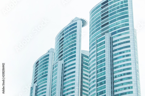 Modern residential skyscrapers for real-estate buy or rent in futuristic city.