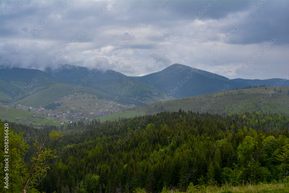 Mountain landscape, in the background - Ukrainian mountain Khomyak in the clouds.