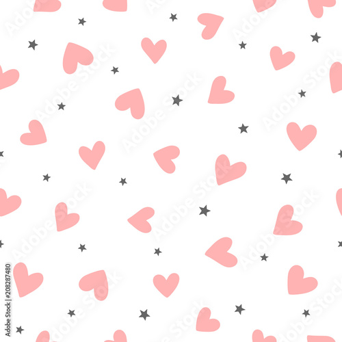 Repeating hearts and stars drawn by hand. Cute romantic seamless pattern. Endless girly print.