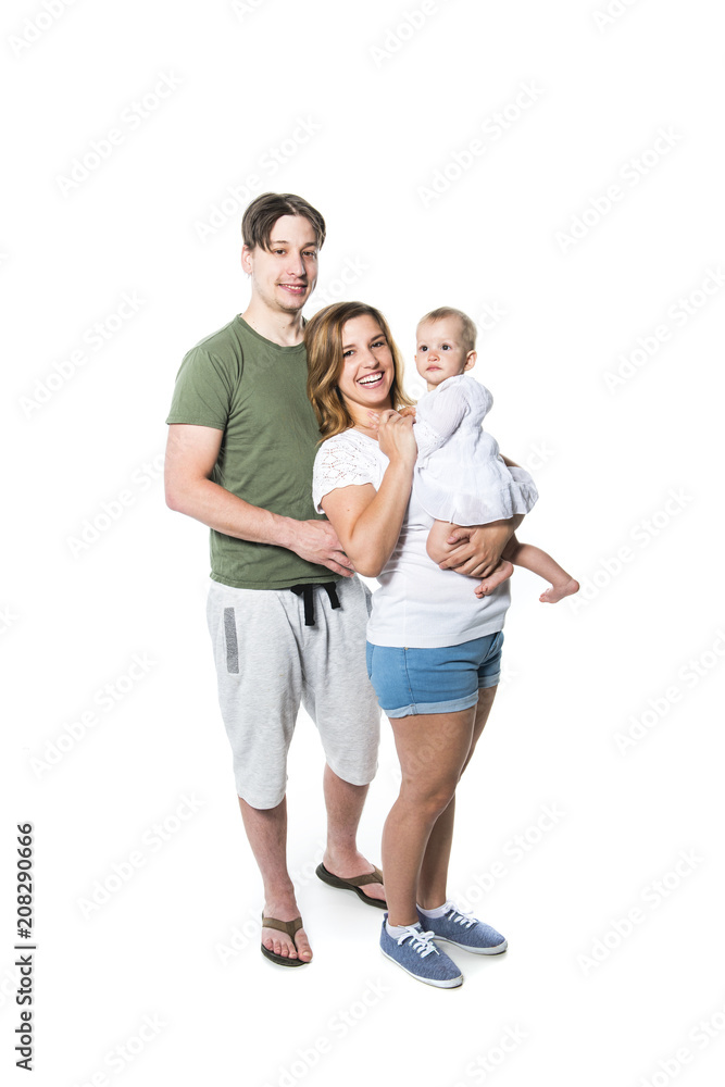 Mother, father and small daughter on studio white