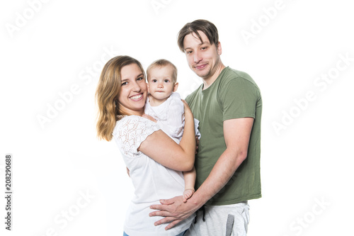 Mother, father and small daughter on studio white