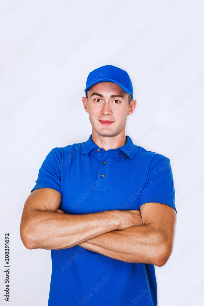 Delivery Concept: Portrait Young caucasian Handsome delivery man or courier