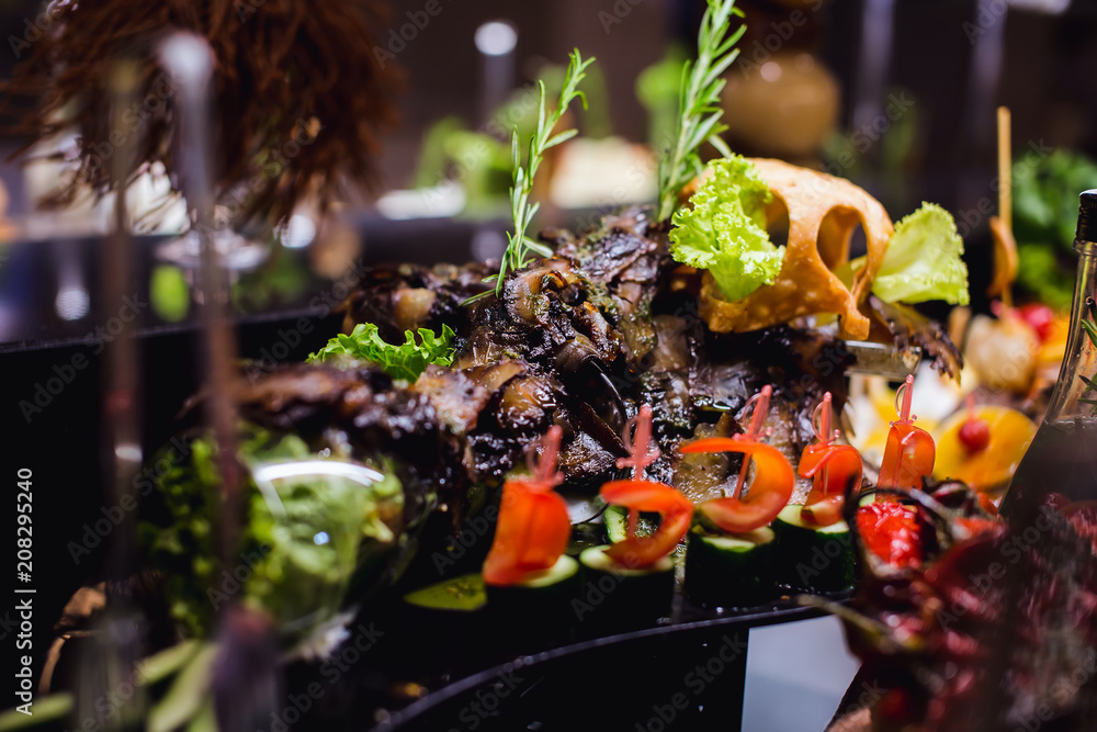 Aubergine cooked on a grill, cut in long pieces and beautifully laid out on a wooden board. Meat for Vegetarian. Aubergine cooked on a grill, cut in long pieces and beautifully laid out on a wooden board. Meat for Vegetarian.