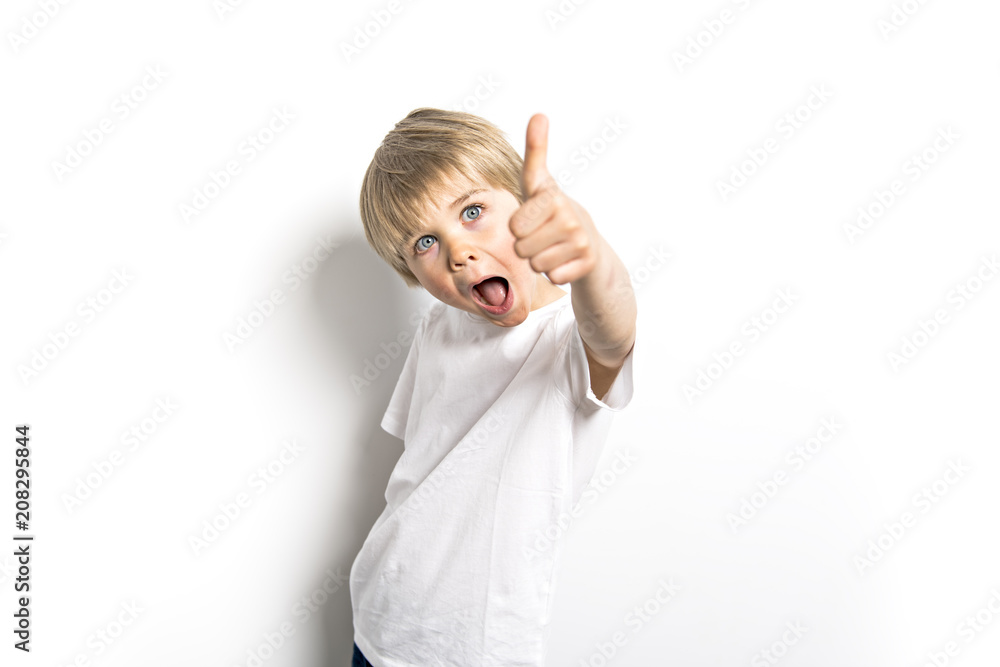 cute five year old boy studio portrait on white background cute five year old boy studio portrait on white background