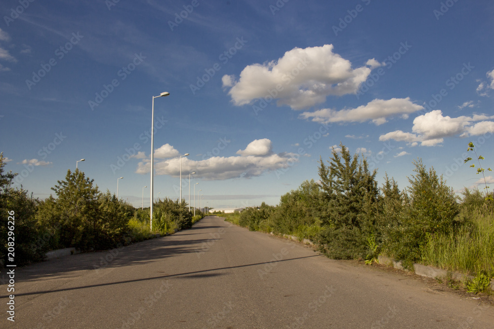 the road against the blue sky