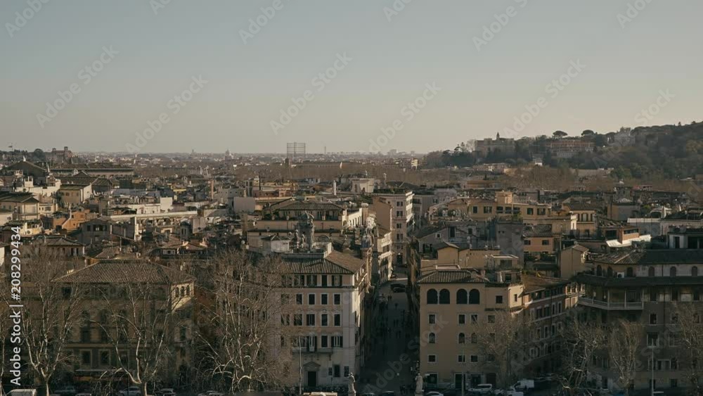 Rome panorama as seen from Castel Sant Angelo. Cold and sunny summer day. Europe Italy. Scenery. Left ot right pan real time medium shot Rome panorama as seen from Castel Sant Angelo. Cold and sunny summer day. Europe Italy. Scenery. Left ot right pan real time medium shot