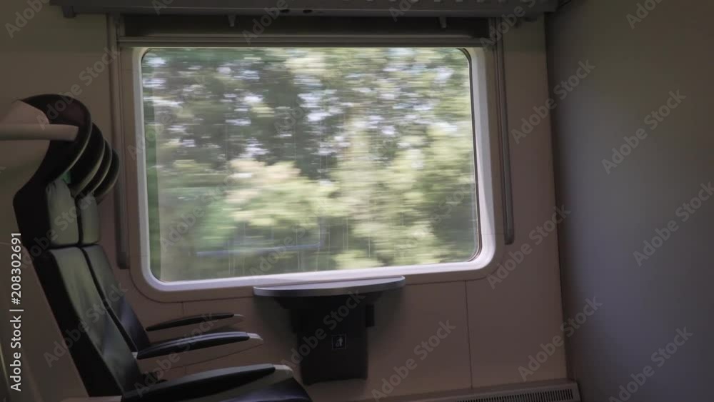 View from moving train window View from moving train window