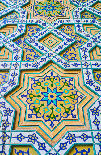 The Persian patterns on wall, Kerman, Iran photo