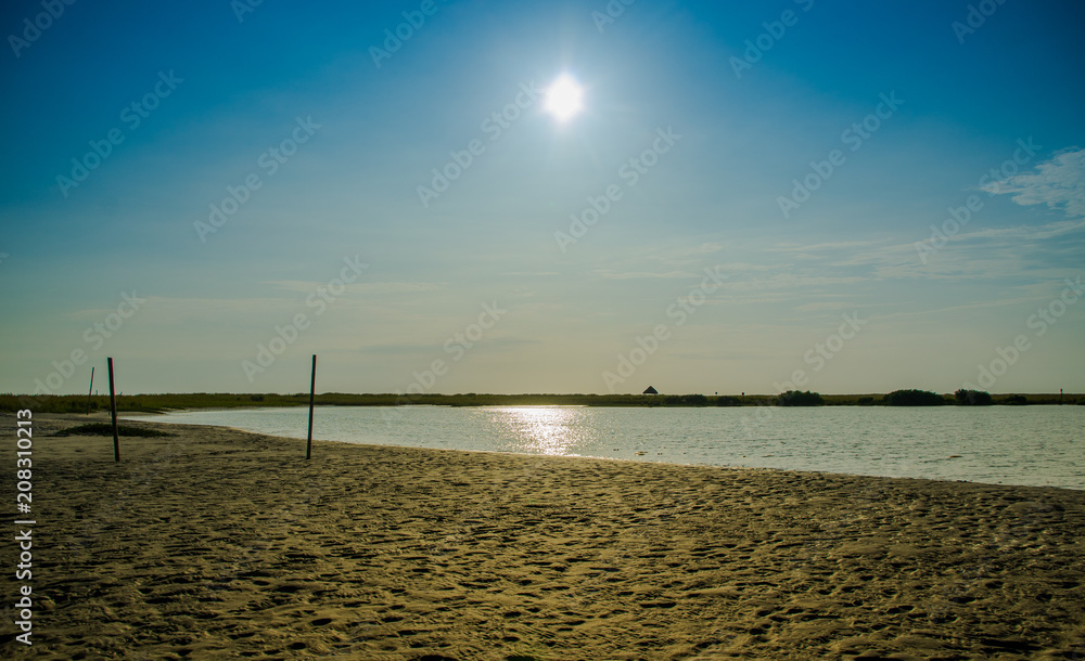 Outdoor view of sunshine in the sky in the beach of Cojimies Outdoor view of sunshine in the sky in the beach of Cojimies