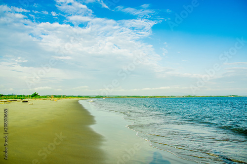 Beautiful outdoor vierw of empty tropical beach background. Horizon with sky and white sand photo