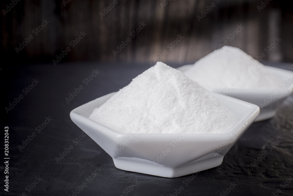 baking soda in a bowl on the table baking soda in a bowl on the table