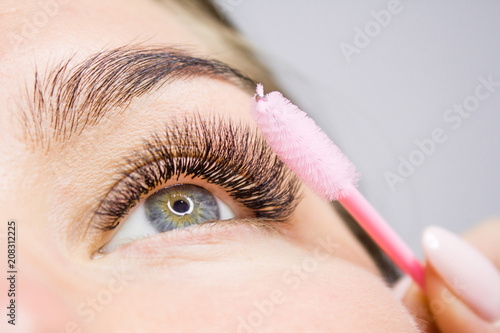 Canvas Print Beautiful Woman with long lashes in a beauty salon