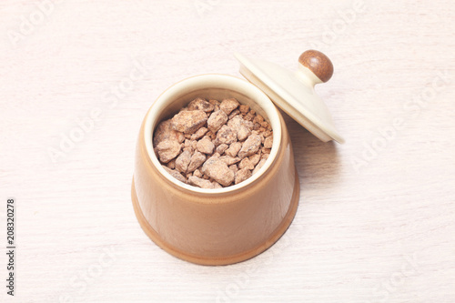 Brown sugar in the ceramic jar 