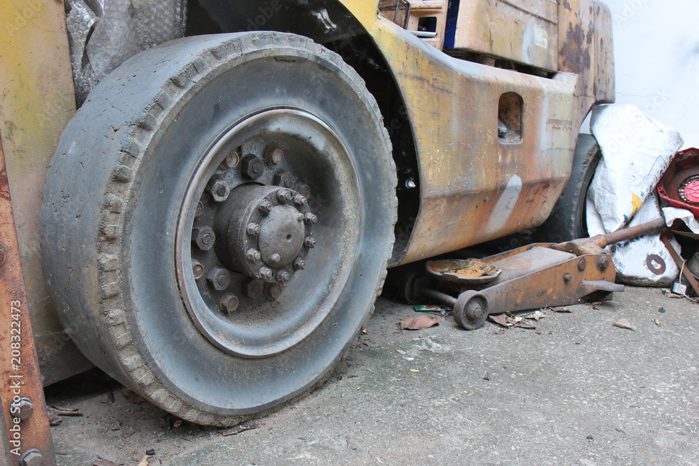 Old useless of tires of old forklift truck Old useless of tires of old forklift truck