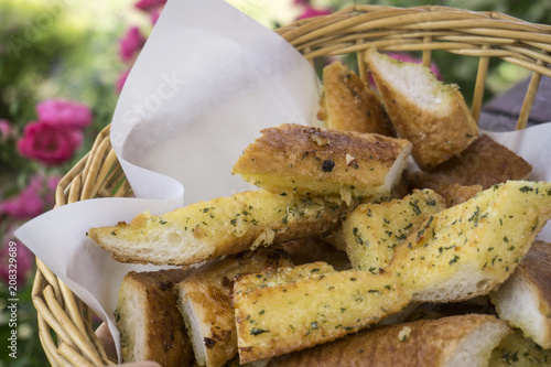 Garlic and herb bread baguette photo