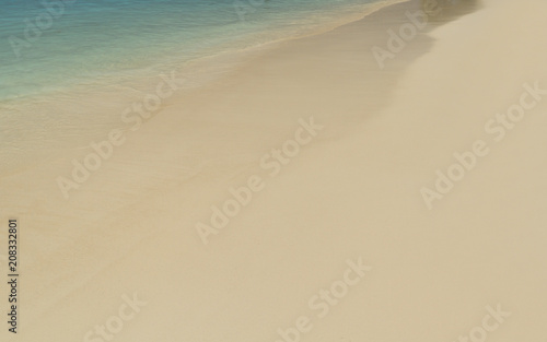 Blue Ocean Wave On Sand Beach  Natural Background.