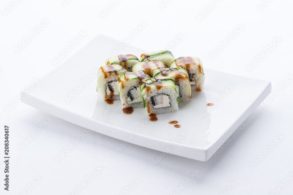 Sushi set and composition at white background. Japanese food restaurant, sushi maki gunkan roll plate or platter set. Sushi set and composition at white background. Japanese food restaurant, sushi maki gunkan roll plate or platter set.