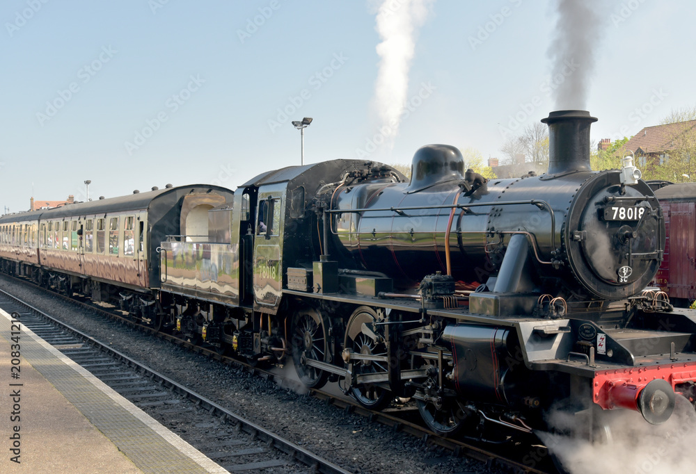 Steam engine on North Norfolk Railway at Sheringham station Steam engine on North Norfolk Railway at Sheringham station
