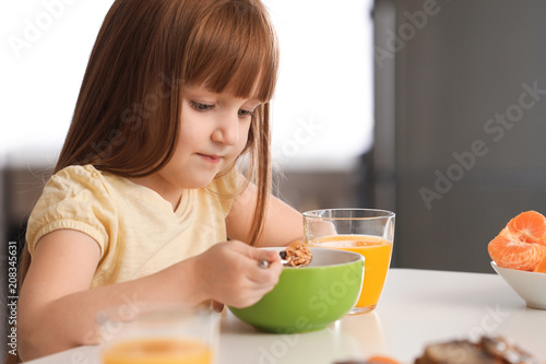 Funny little girl having br...