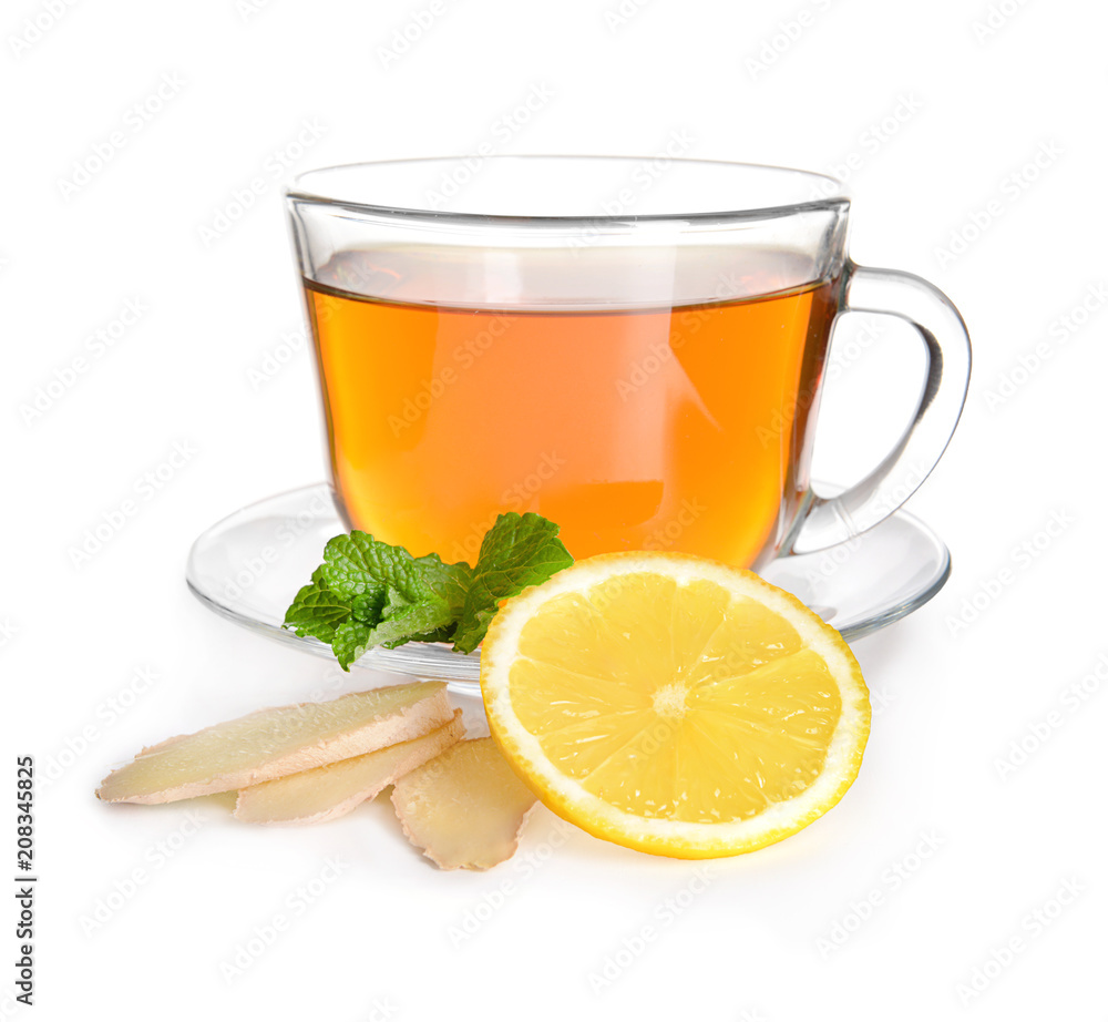 Cup of delicious tea with mint, ginger and lemon on white background Cup of delicious tea with mint, ginger and lemon on white background