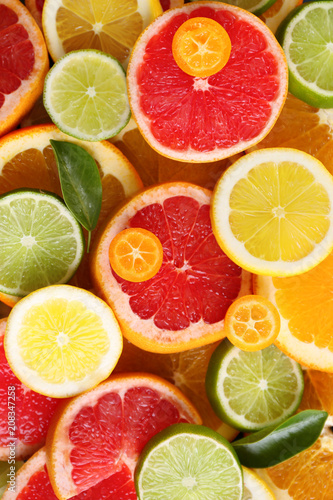 Slices of fresh citrus fruits as background