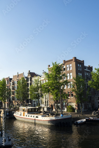 On the banks of the canals of Amsterdam  magnificent boats are transformed into houses