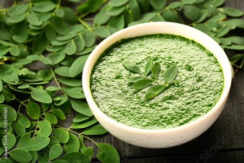 Healthy vegan soup made of Moringa oleifera leaves.