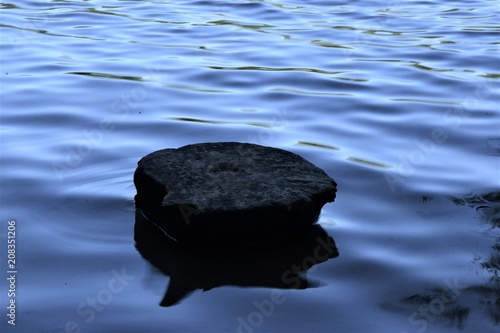 stone floating on the water