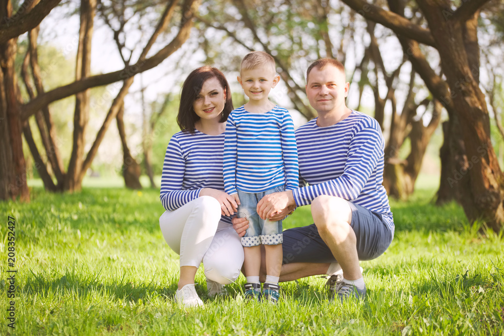 happy family in summer park happy family in summer park