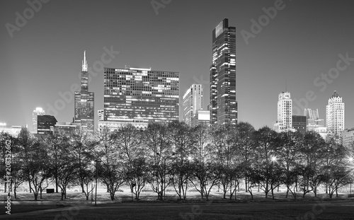 Black and white picture of Chicago skyline at night, USA.