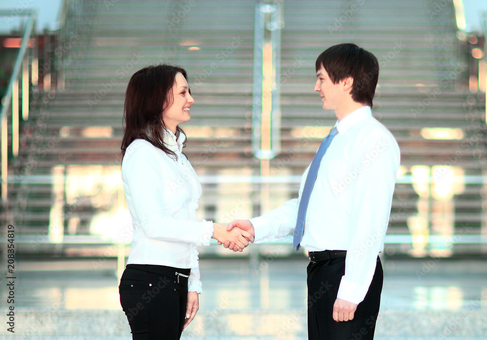 businesswoman and client handshaking businesswoman and client handshaking