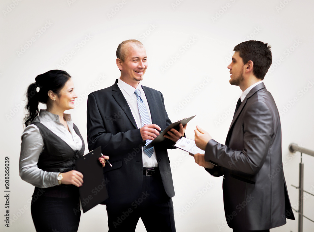 image of a business team discussing the latest financial results image of a business team discussing the latest financial results