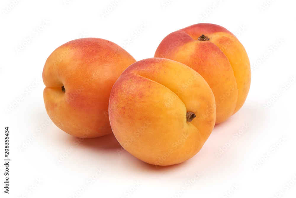 Fresh whole apricots, isolated on white background. Fresh whole apricots, isolated on white background.