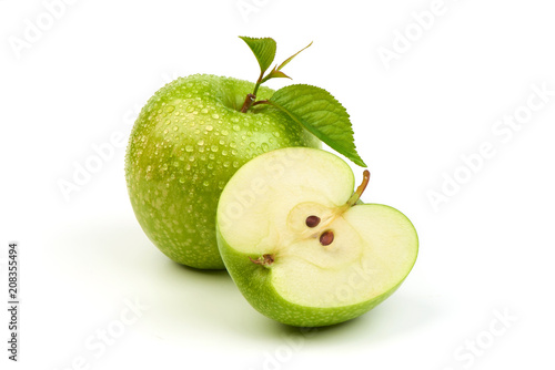 Whole green apple granny smith with leaf and half, isolated on white background. photo