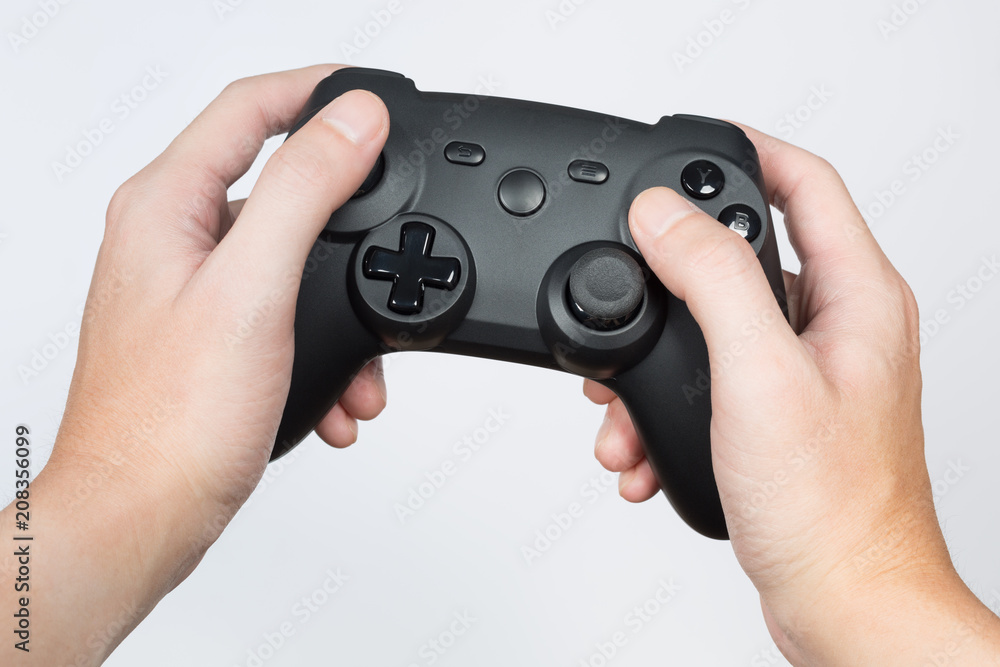 Fototapeta premium Play game with a wireless joystick